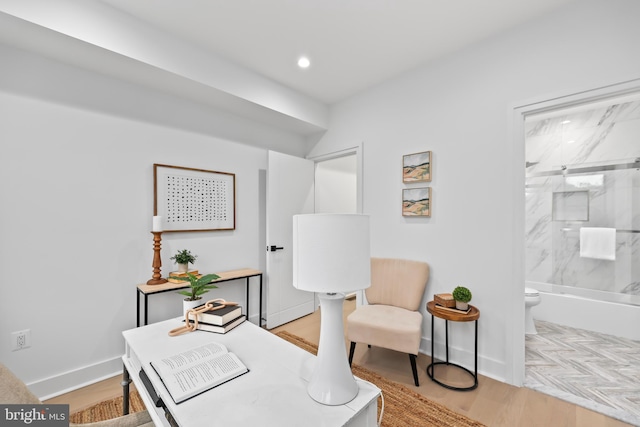 living area featuring light hardwood / wood-style floors