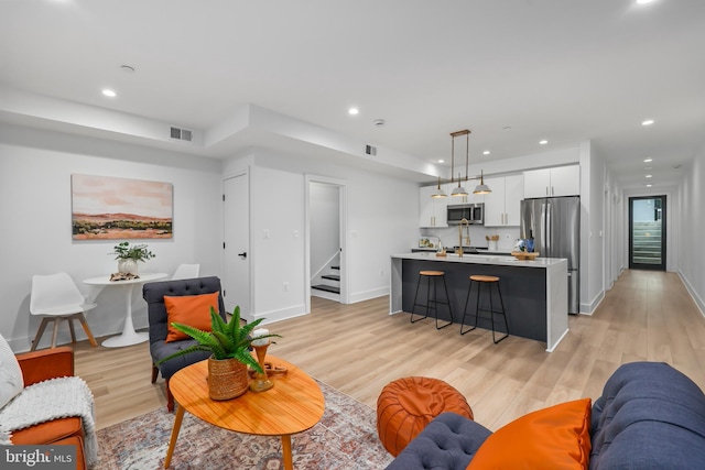 living room with light wood-type flooring