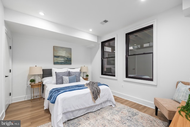 bedroom featuring hardwood / wood-style flooring