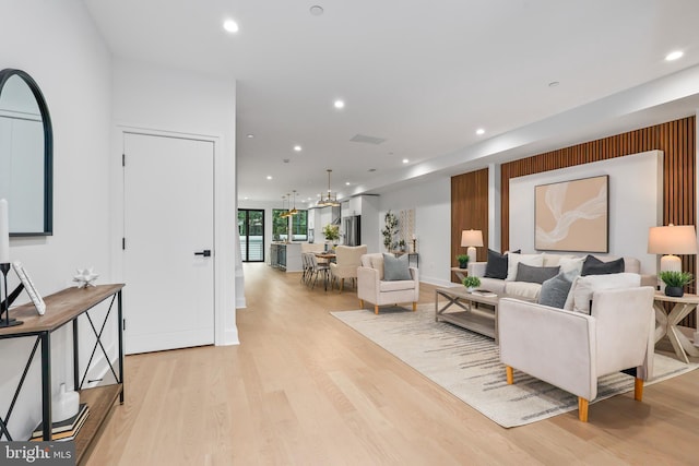 living room with light hardwood / wood-style floors