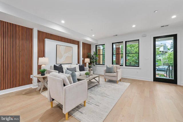 living room with light hardwood / wood-style floors