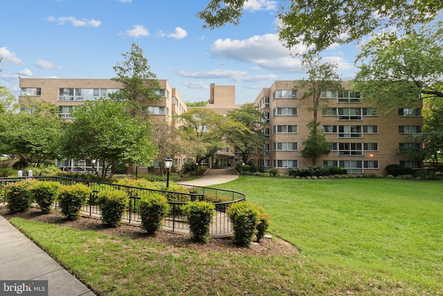 view of community with a yard