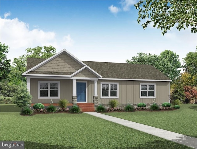 craftsman-style house featuring roof with shingles and a front lawn