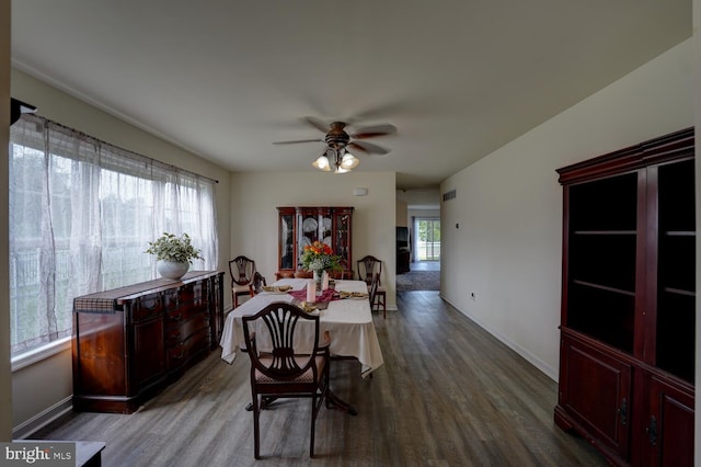 dining area featuring ceiling fan and hardwood / wood-style flooring