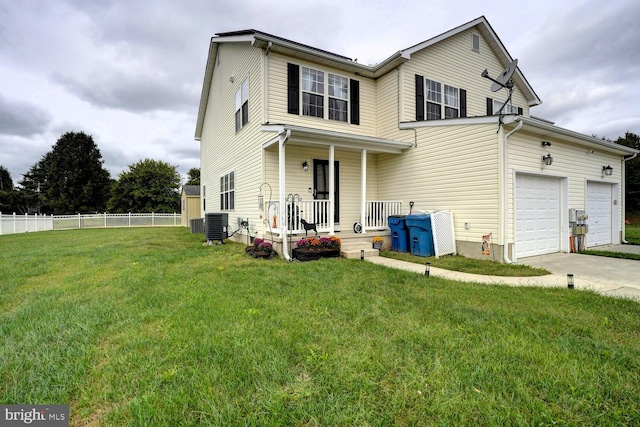 view of front of house featuring a front yard, cooling unit, and a porch