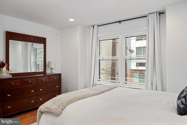 bedroom featuring light hardwood / wood-style floors