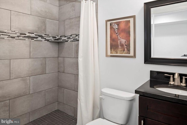 bathroom featuring vanity, toilet, and a shower with curtain