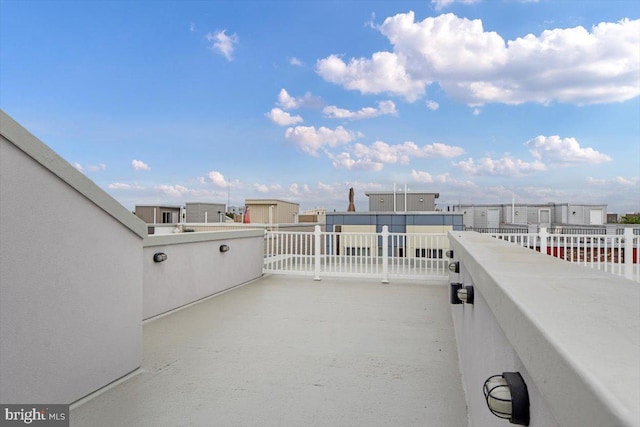 view of patio / terrace with a balcony