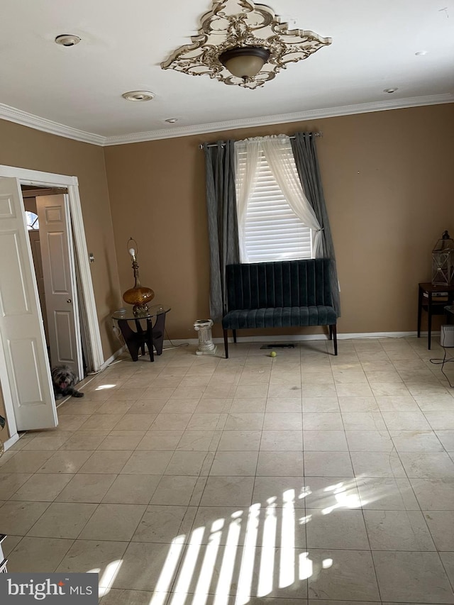 unfurnished room with crown molding and light tile patterned flooring