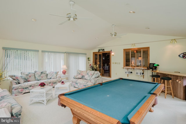 recreation room with ceiling fan, carpet flooring, bar area, billiards, and vaulted ceiling