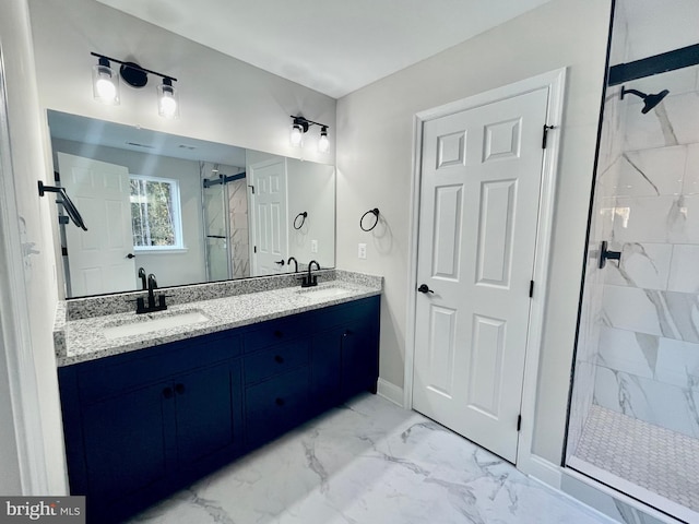 bathroom featuring walk in shower and vanity