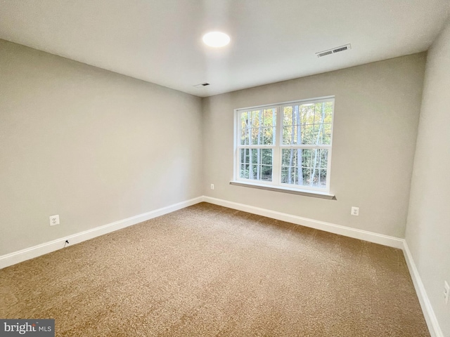 view of carpeted spare room