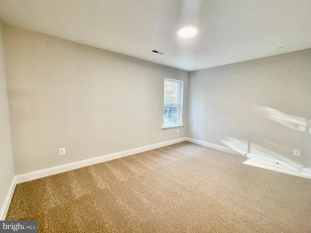 view of carpeted spare room