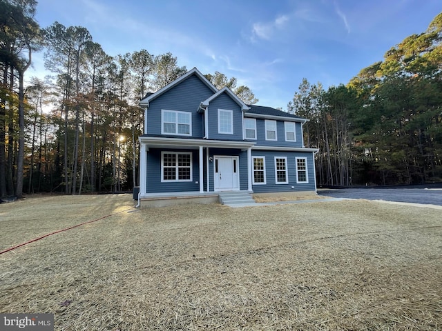 view of property featuring a porch