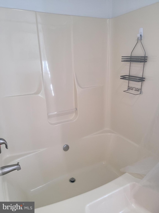 bathroom with shower with separate bathtub