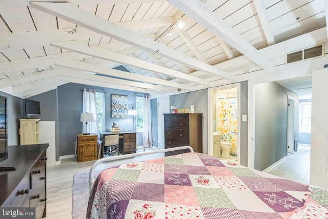 bedroom with lofted ceiling with beams, light wood-type flooring, connected bathroom, and wood ceiling