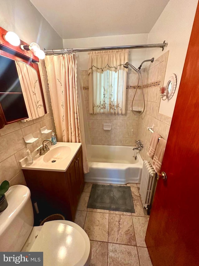 full bathroom with shower / tub combo with curtain, vanity, radiator heating unit, and toilet