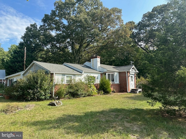 exterior space with a front lawn