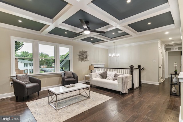 living room featuring ceiling fan with notable chandelier, coffered ceiling, beam ceiling, and dark wood-type flooring