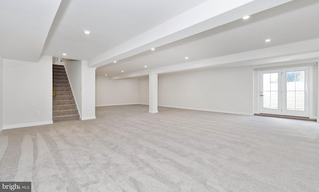 basement with light colored carpet