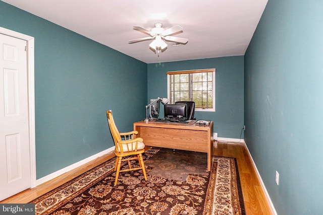 office area with hardwood / wood-style floors and ceiling fan