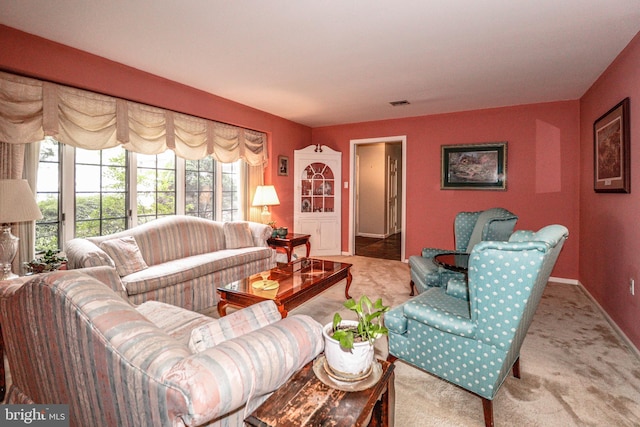 living room with light colored carpet