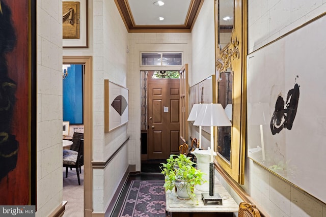 entrance foyer featuring crown molding