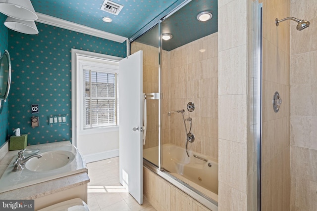 bathroom with shower / bath combination with glass door, vanity, tile patterned flooring, and ornamental molding