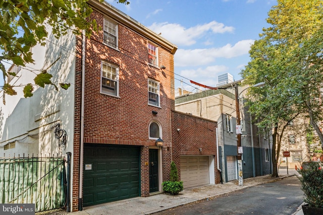 exterior space with a garage