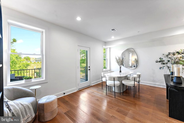 dining space featuring dark hardwood / wood-style flooring