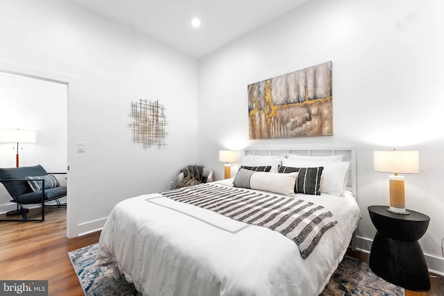 bedroom featuring hardwood / wood-style floors