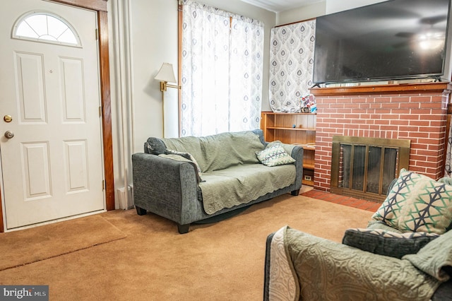 carpeted living room featuring a fireplace