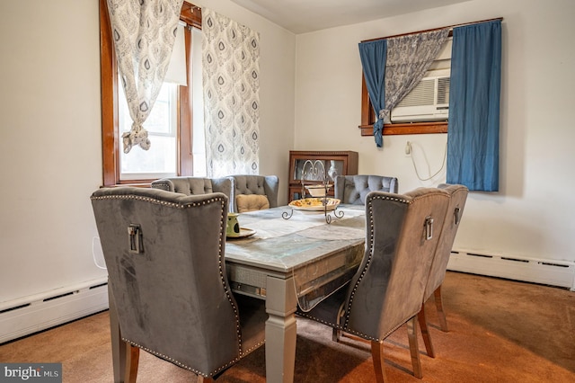 carpeted dining area featuring baseboard heating