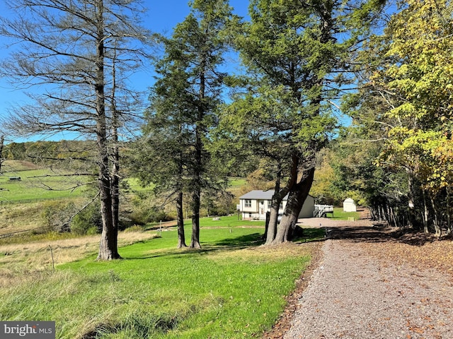 exterior space featuring gravel driveway