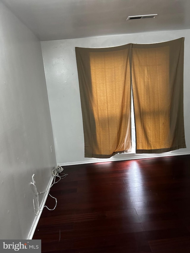 empty room featuring hardwood / wood-style floors