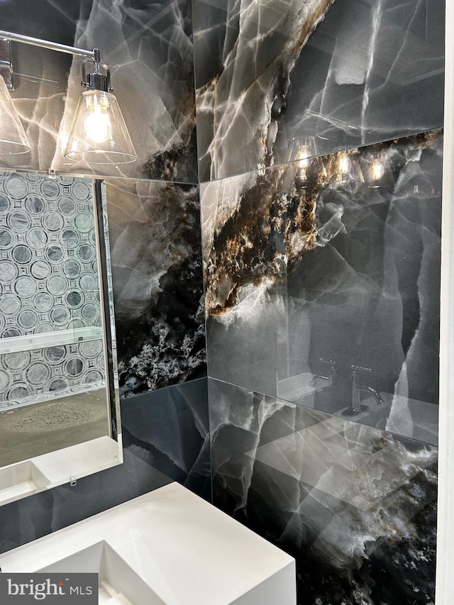 bathroom with tile walls and decorative backsplash