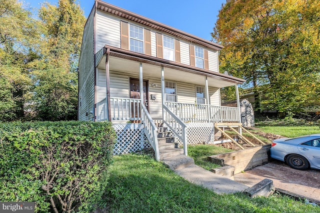 view of property with covered porch