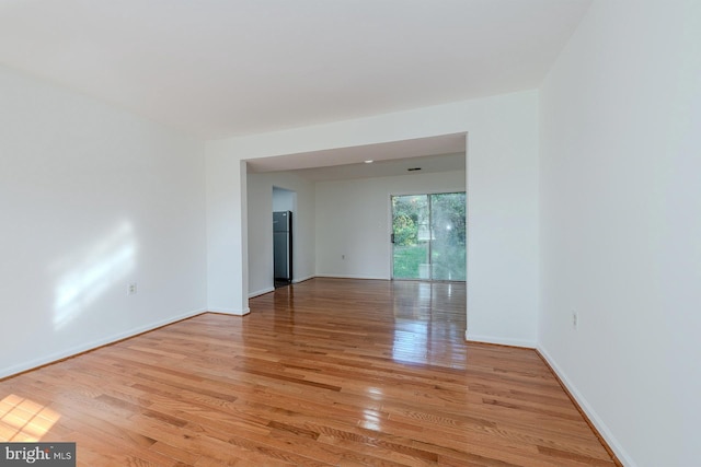 empty room with light wood-type flooring