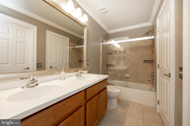 full bathroom with shower / bath combination with glass door, vanity, toilet, ornamental molding, and tile patterned flooring