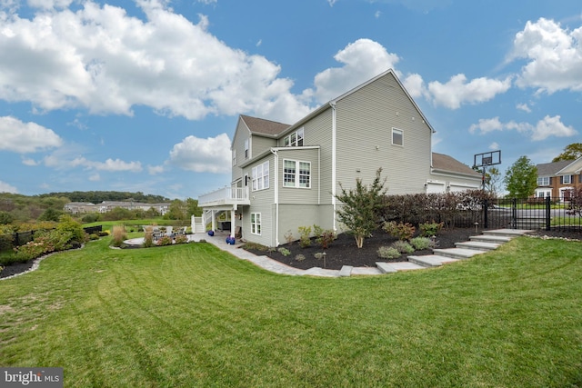 rear view of property with a yard