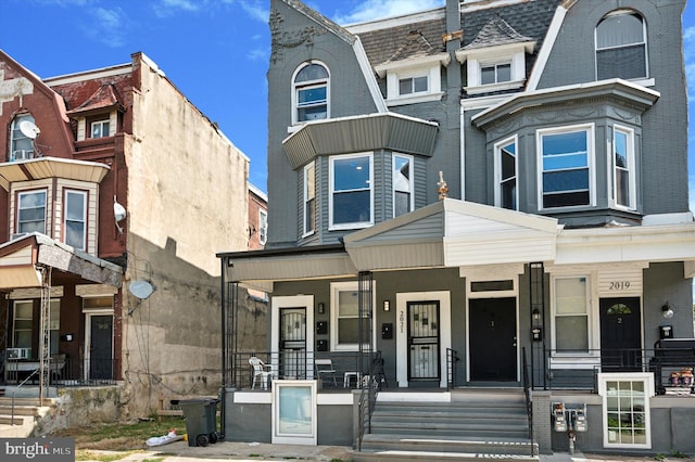 view of property with a porch