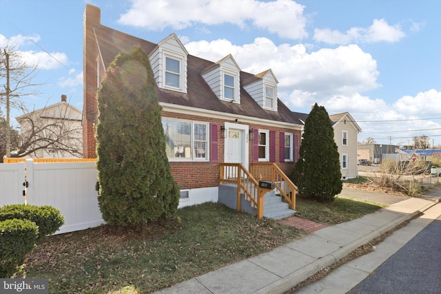 view of new england style home