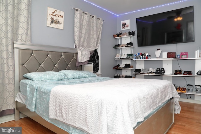 bedroom featuring wood-type flooring