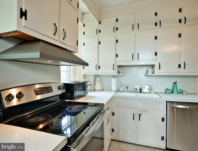 kitchen featuring white cabinetry, appliances with stainless steel finishes, sink, and crown molding