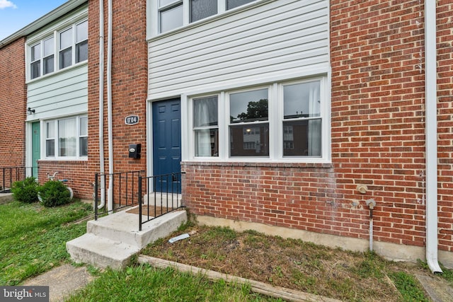 1704 Melbourne Rd, Dundalk, MD 21222 - property entrance featuring brick siding