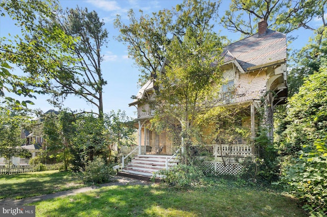 exterior space with a front yard