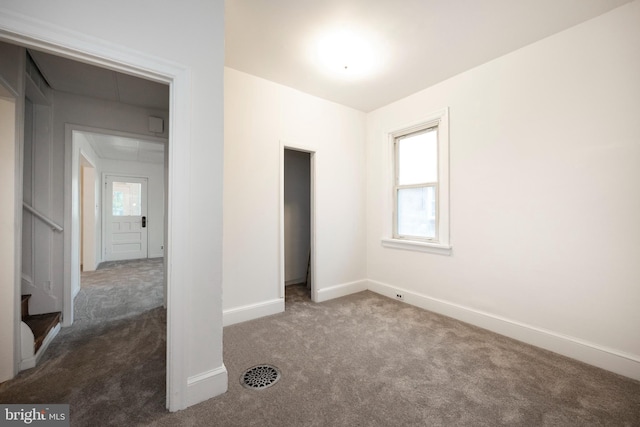 unfurnished bedroom with carpet