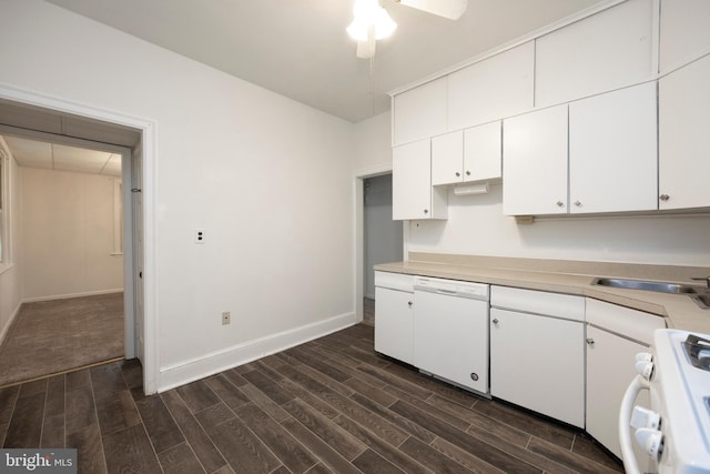 kitchen with white cabinetry, white appliances, ceiling fan, dark hardwood / wood-style floors, and sink