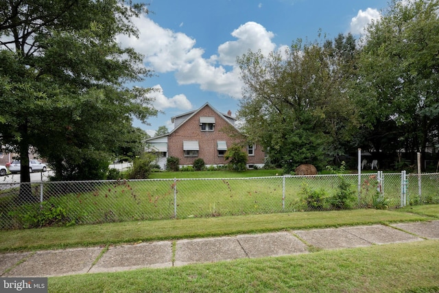 view of front of home with a front yard