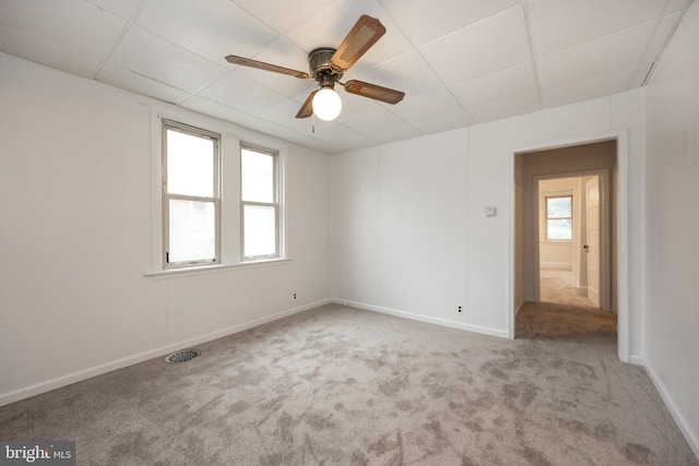 carpeted empty room with ceiling fan